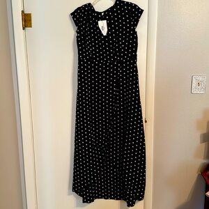 Cute little black/white polka dotted dress. Sz Lrg